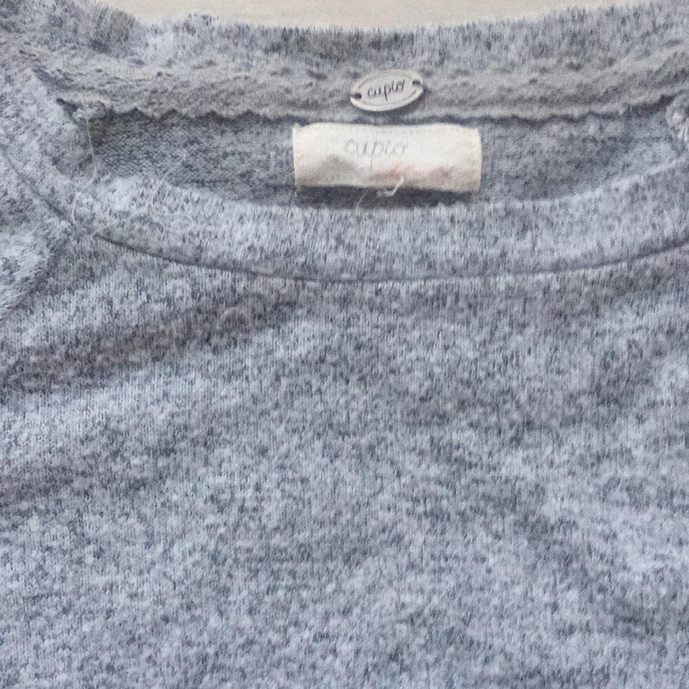 Gray Cupio sweater.